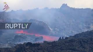 Spain: River of lava pours down La Palma road