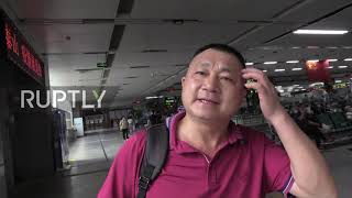 China: Thousands flood Shenzhen station as "Golden Week" holiday begins