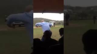 South African President Jacob Zuma performs a Zulu dance with bare-breasted women.