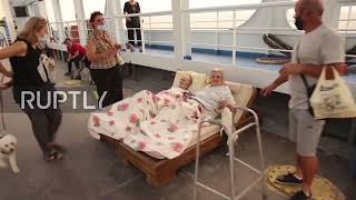 Greece: Evia residents find shelter on ferry as wildfires raze forests and homes