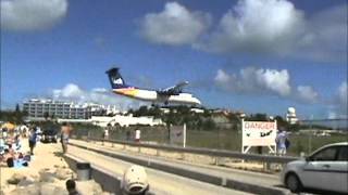 Airplains flying over busy beach! Dangerous Beach at St. Maarten