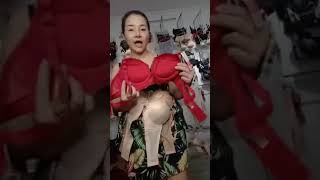 Selling bra and underwear try on the front of the camera