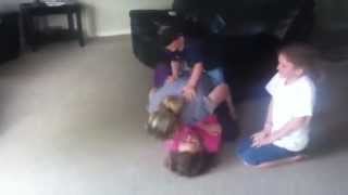 Mom wrestling with kids WWF Style