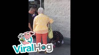 Lady Confronts Kid Outside of Target for Selling Candy || ViralHog