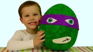 Черепашки Ниндзя огромное яйцо с сюрпризом открываем игрушки Giant surprise egg TMNT toys