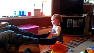 Tickling grandpa's feet