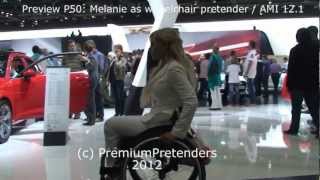 P50: wheelchair pretending with Melanie - at the car fair