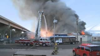 Raw video: Explosion sends firefighter running
