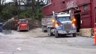Kubota SVL 90 loading truck and pony trailer