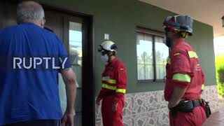 Spain: Residents evacuated due to volcano eruption return home to collect their belongings