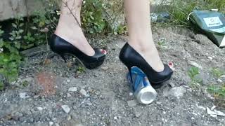 Fish mouth high heels treading can of drink