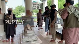 'This is the city of the brave, and we are brave' - Taliban pose for photos at king's mausoleum