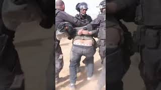 Police on horseback arrest Palestinian Bedouins in Israel desert