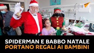 Cile: Spiderman e Babbo Natale portano regali ai bambini