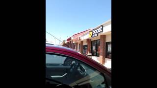Drunk lady walking out of liquor store!