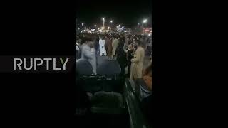 Afghanistan: Crowds gather at airport in hope to leave Kabul as Taliban sweep into capital