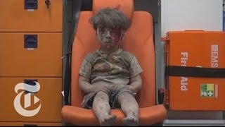 The Syrian Boy Pulled from the Rubble in Aleppo | The New York Times