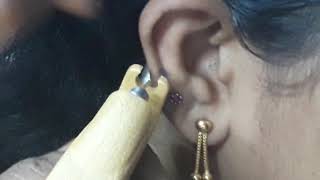 Ear Pressing In Tamil