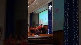 Spanish choir singing with bells