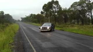 Ford ute drifting in the wet