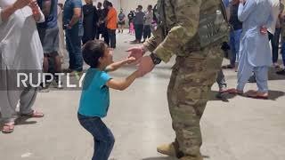 Qatar: Music performance sees Afghan refugees, American soldiers together in US camp