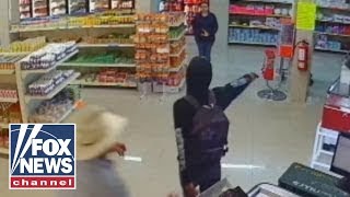 Customer wrestles gun from armed robber in Mexico