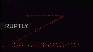 Armenia: Russian offensive supporters form 'Z' and 'V' with candles in Yerevan