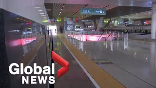 Coronavirus outbreak: Wuhan lockdown leads to empty streets, train stations