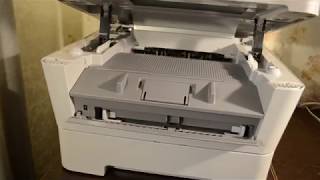 МФУ Brother dcp-7057r не берет бумагу