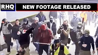 VIDEO: Insurrectionist Throws Garbage Can At Police Officer's Head
