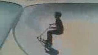 Backflip over a spine on a scooter