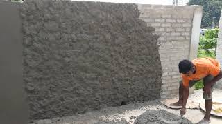 India style of plastering a wall