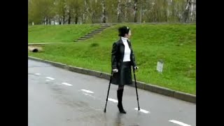 Oldies Amputee woman crutching