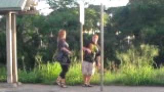 Girl Slapping Guy At Bus Stop