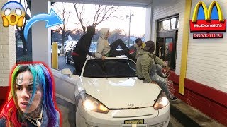 Blasting GAY SONGS AT THE DRIVE THRU IN THE HOOD !