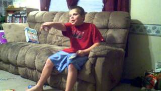 Boy lovin his popcorn on webcam