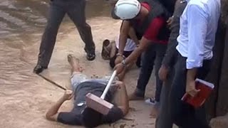 Thailand murder suspects forced to re-enact killing