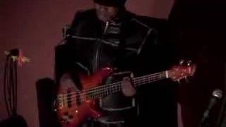 Africa's best-known bass player, Ngouma Lokito, warming up