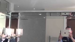 FM&G Bevelled mirrors around a sink unit