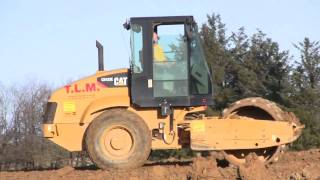 Cat CS-433E Padfoot Roller Compacting Sticky Clay
