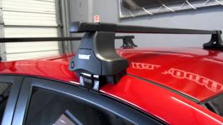 2012 HYUNDAI Accent 4 Dr Sedan with Thule Square Bar Roof Rack by Rack Outfitters