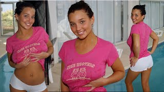 Christina Model - Pink T-Shirt & White short shorts in the pool
