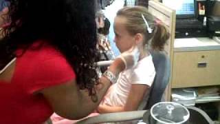 Skylar getting earrings - tough kid.