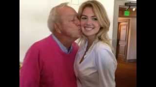 Arnold Palmer gave Kate Upton a kiss..