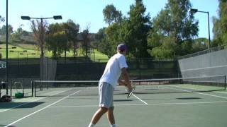 Serve rear view U Washington's Kyle McMorrow