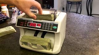 How to count over 300 $1 bills in less than 30 seconds