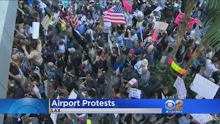 Thousands Of Anti-Trump Supporters Gather At LAX