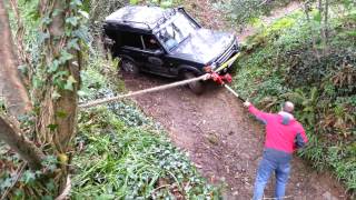 Using Hi Lift jack as winch to get Discovery out.