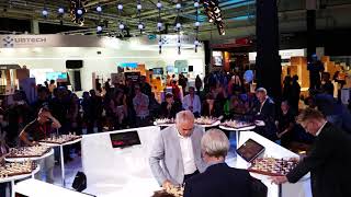 Garry Kasparov playing fast chess against 8 players