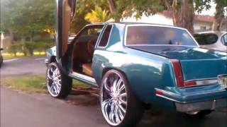 87' Cutlass Squatin on 28's, Lambo Doors, Gator Guts